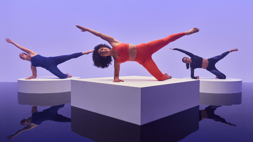 a group of ladies in various pilates pose