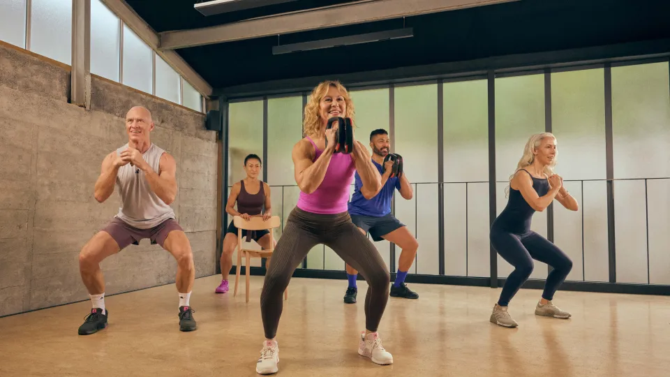 a group of people performing a variety of functional exercise