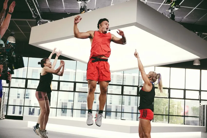 Instructors performing high-jump