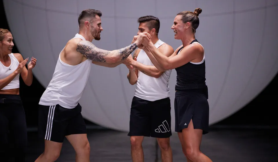 Rachael Newsham celebrating with another Instructor